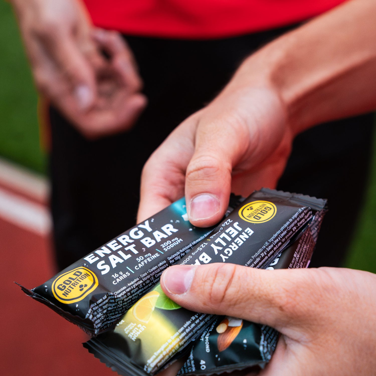 Goldtnutrition salt bars, runners holding them