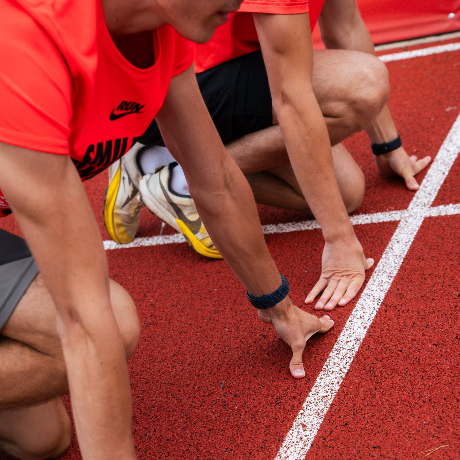 runners in the arena